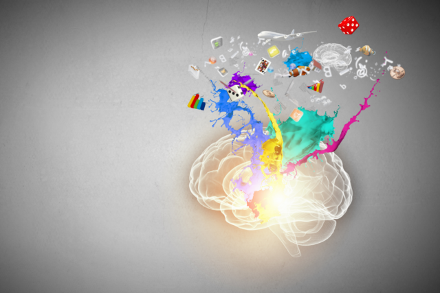 Illustrated brain with colourful splashes and objects exploding outward, representing creative thinking and overthinking